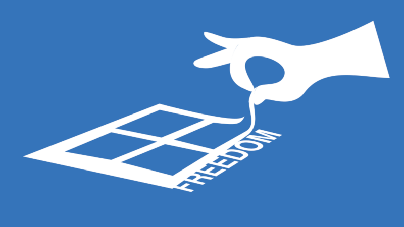 Illustration of a hand removing what looks like a Windows logo sticker partially covering the word Freedom. All is white with a blue background